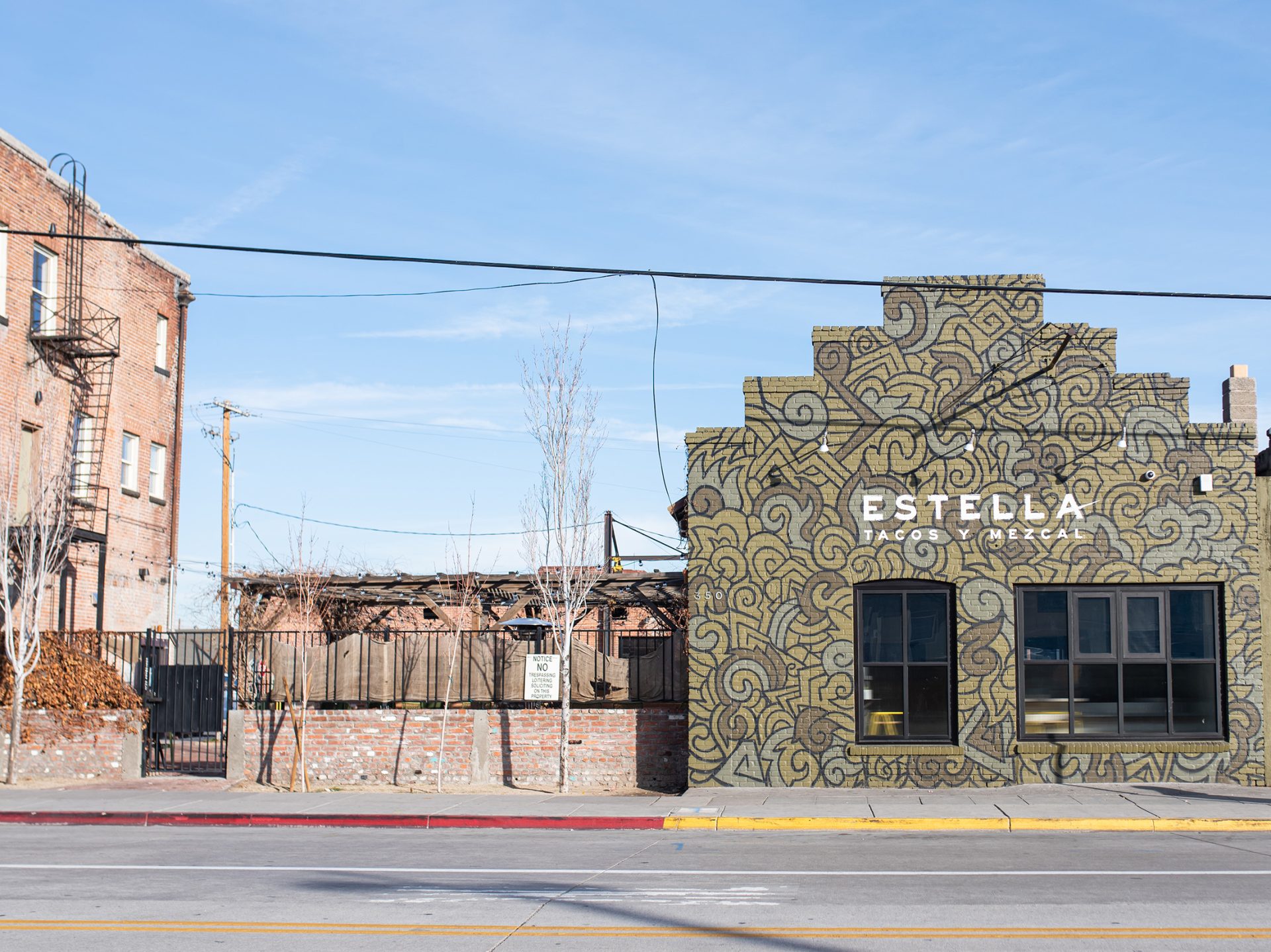 Rushton Smith - Custom Brand Design - Estella Tacos Y Mezcal Restaurant - Brand Mural Street View of Restaurant