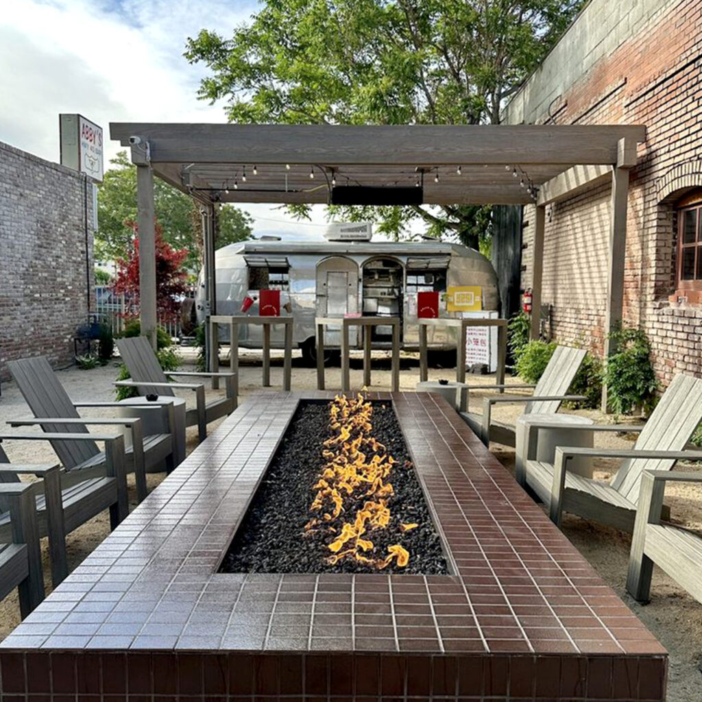 Hospitality Branding Dumpling Queen's courtyard fire pit, Reno NV