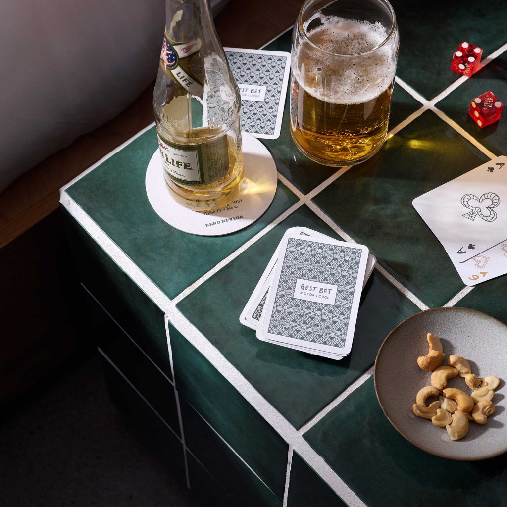 Micro-experiences that guests photograph, share, and take home. Custom playing cards turn a standard stay into something guests talk about long after checkout.