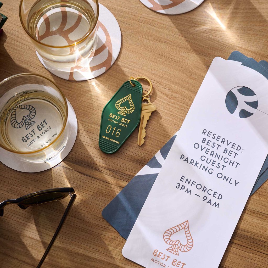 Best Bet Motor Lodge, lobby arrival, drink, room key, parking placard