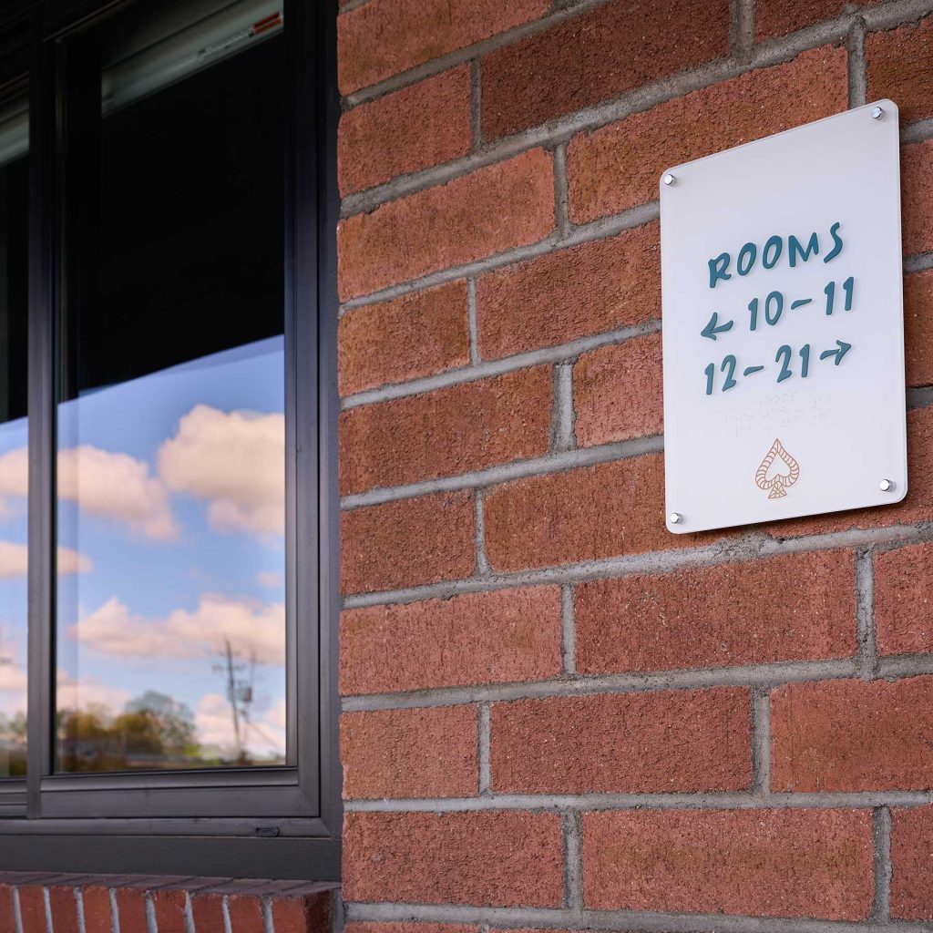 Comprehensive on brand signage system was developed across the hotel environment, spanning arrival points, to room numbers.
